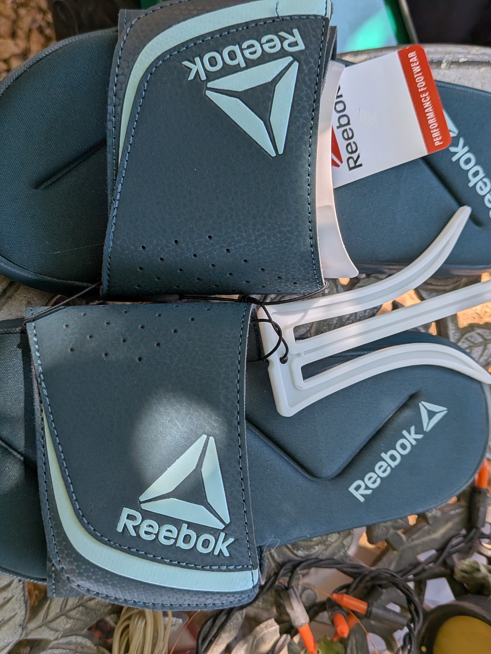 Reebok  Slide Sandals in Black with Light Mint Logo